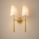23.25-inch two-light wall sconce in vintage brass with raw silk shades