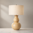 27-inch mustard ceramic table lamp with beige linen drum shade